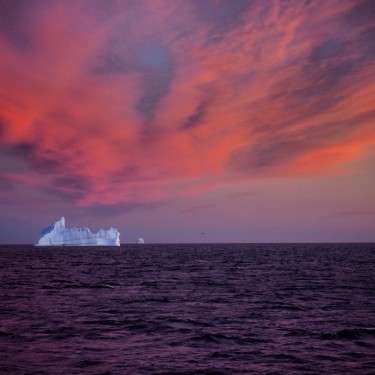 Icebergs and sunset off the west coast of Greenland.