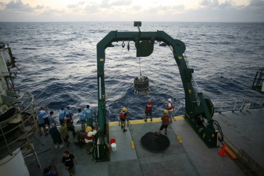 Participants in the XPRIZE gather to watch their instruments deployed off the coast of Hawaii.