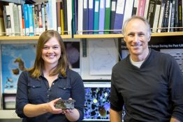 UW doctoral student Jillian Schleicher and UW professor of Earth and space sciences George Bergantz with a Mauna Loa basalt samples they will compare with the simulation results.