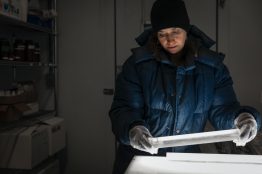 Becky Alexander in the cold room of the UW’s IsoLab with sections of an ice core. Her group is now analyzing ice cores from Antarctica to see if they show the same trend as in Greenland.