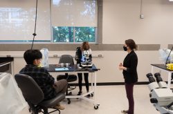 Students participate in a socially-distanced in-person lab.