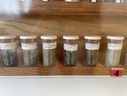 vials of various kinds of sand