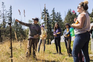A faculty member with the Program on the Environment teaches about food production and sustainability while hosting students at SkyRoot farm, a 20-acre, certified organic, integrated animal and vegetable farm on South Whidbey Island.